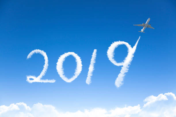 istock happy new year 2019 concept.drawing by airplane in sky 1056751416