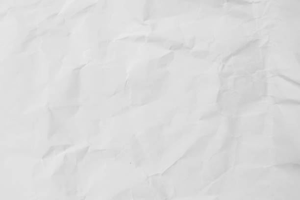 istock white wrinkle recycle paper background 1056751710
