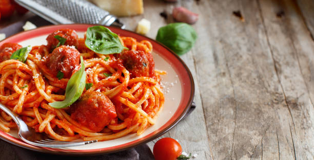 istock Pasta with tomato sauce and meatballs 1056758566