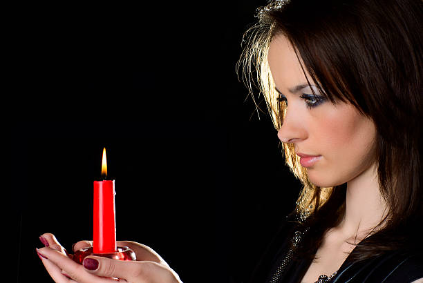 istock Woman with candle. 105676509