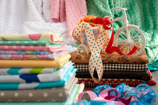 istock Cotton fabrics are folded. Fabric store. 1056769234