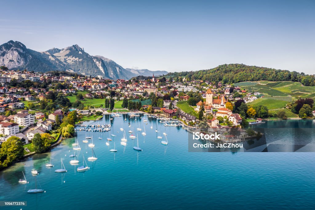 Spiez castle by lake Thun in Canton of Bern, Switzerland high angle view from drone point of Spiez town Switzerland Stock Photo