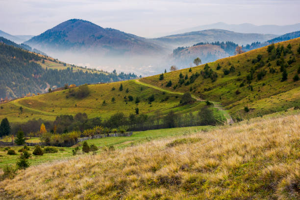 istock autumn scenery of mountainous countryside 1056772448
