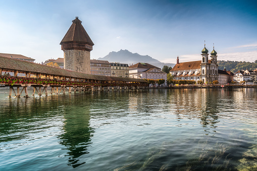 Chapel bridge and Jesuit Church creates the beauty of the city and gorgeous landmark building, Luzern, Switzerland