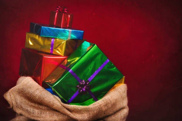 sack of saint nicholas with presents - piet imagens e fotografias de stock