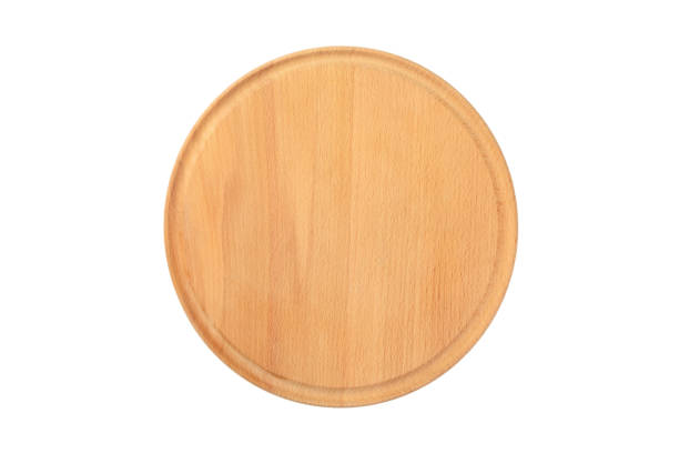 istock Big round cutting board isolated on white background. Top view 1056781852