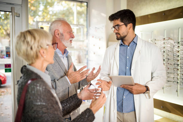 istock Senior couple shopping for eyeglasses 1056783346