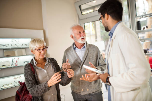 istock Senior couple shopping for eyeglasses 1056784686