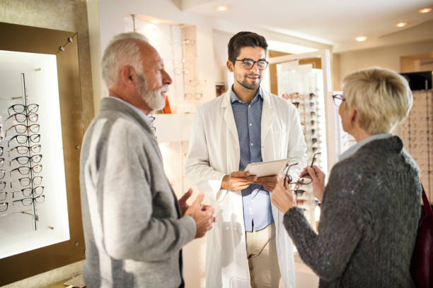 istock Senior couple shopping for eyeglasses 1056784838