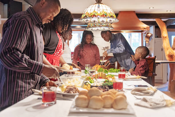 istock African-American during thanksgiving dinner 1056785876