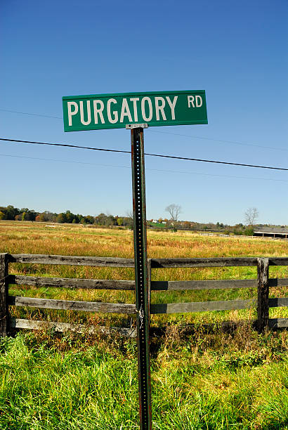 droga do purgatory - heaven hell road sign sign zdjęcia i obrazy z banku zdjęć