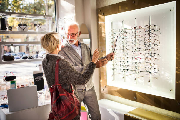 istock Senior couple shopping for eyeglasses 1056790610