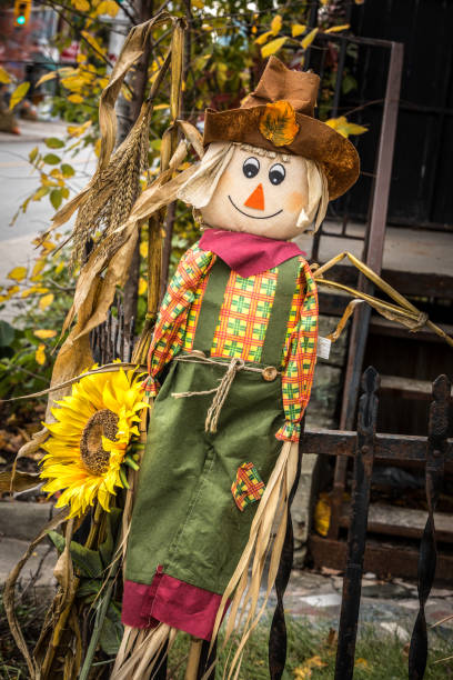 istock Happy smiling Halloween scarecrow puppet decorations. 1056792944