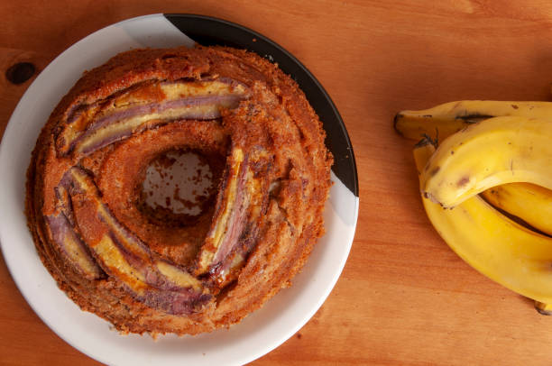 istock banana cake on wooden table 1056793432