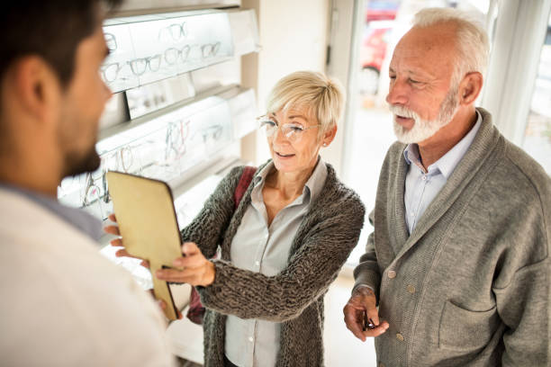 istock Senior couple shopping for eyeglasses 1056796670