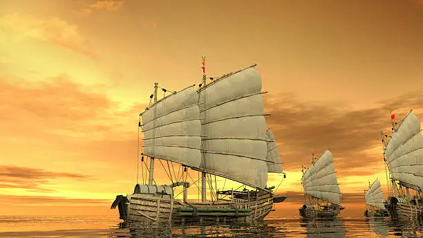 ancient fleet in ocean at dusk