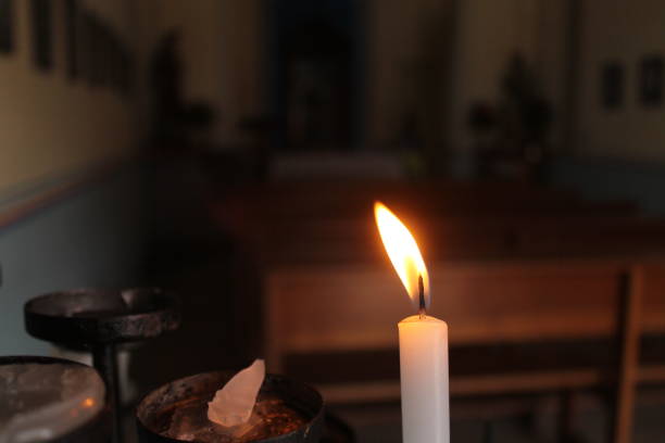 istock Church and candle 1056805226