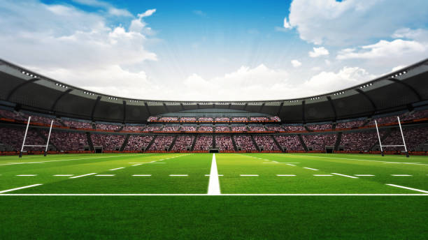 istock rugby stadium with fans and green grass at daylight 1056806474