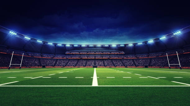 istock rugby stadium with fans and green grass playground 1056806490