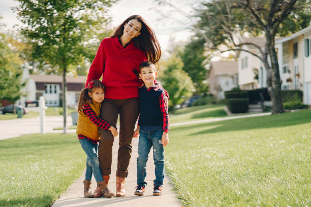 istock Beautiful mother with little kids 1056806578