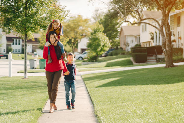 istock Beautiful mother with little kids 1056806624