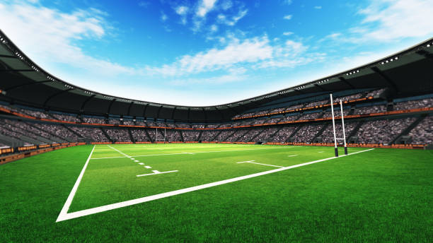 istock rugby stadium with fans and grass pitch at daylight 1056806626