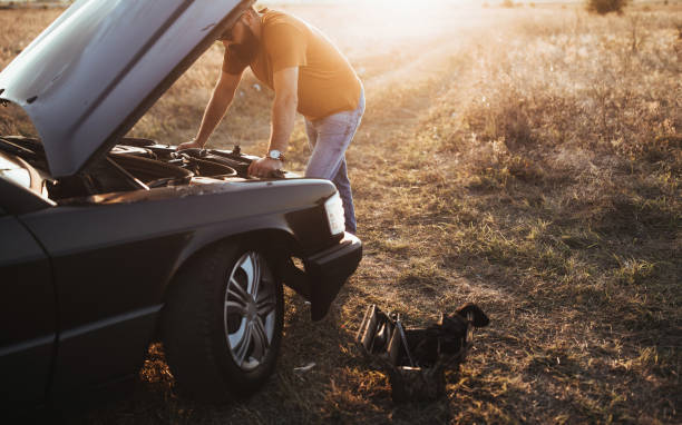 istock Young man is fixing his car 1056824060