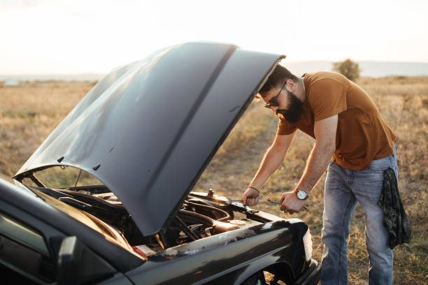 istock Man repairing his car 1056826472
