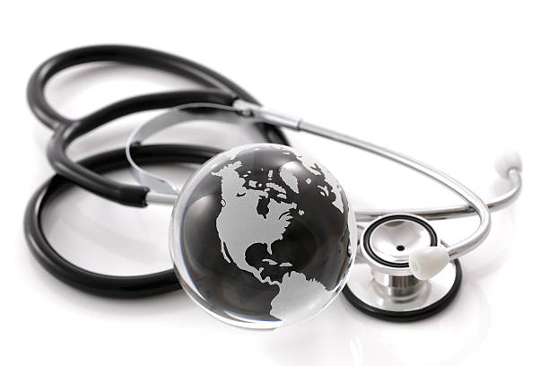istock Stethoscope with globe shot in black and white 105682708