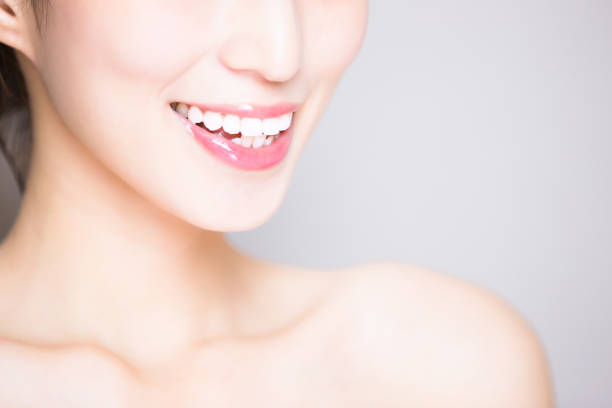 istock close up of woman tooth 1056832566