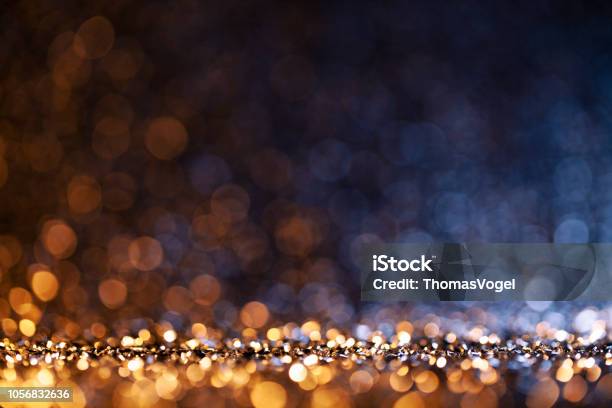 Christmas Lights Defocused Background Bokeh Gold Blue Stock Photo - Download Image Now