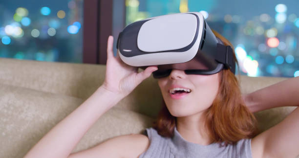 istock woman wear virtual reality headset 1056833404