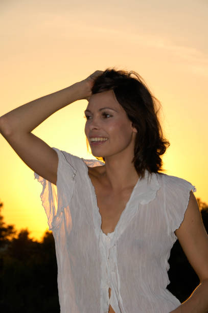 istock portrait woman sunset 1056838298