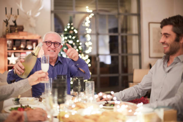 istock Celebrating Christmas, celebratory toast. 1056840982