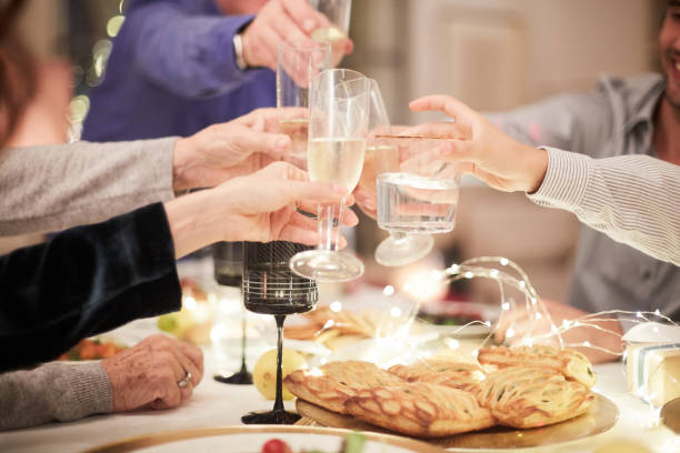 istock Celebrating Christmas, celebratory toast. 1056841008