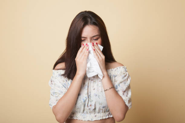 istock Young Asian woman got sick and flu. 1056842902