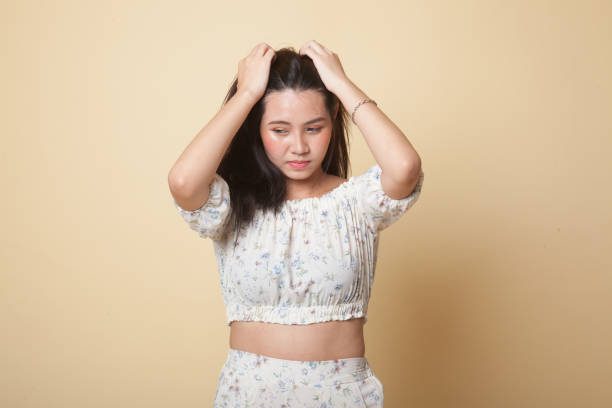 istock Stressed young Asian businesswoman scream out. 1056843132
