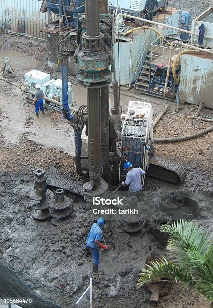 Construction Site Maintaining A Hole Drilling Machine Stock Photo - Download Image Now