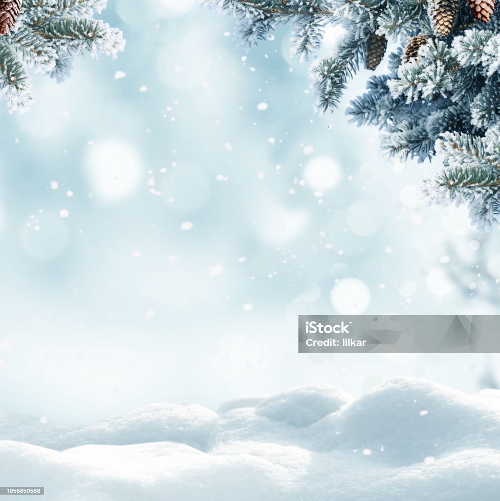 Christmas winter background with snow and blurred bokeh.Merry christmas and happy new year greeting card with copy-space. Christmas Stock Photo