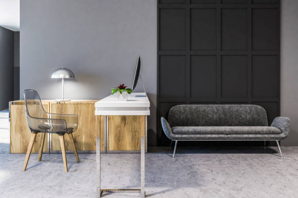istock Gray sofa in minimalist home office interior 1056850826