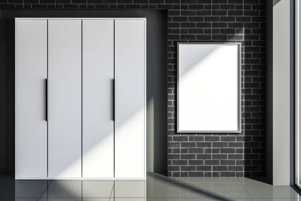 istock Black brick living room, white closet, poster 1056851070