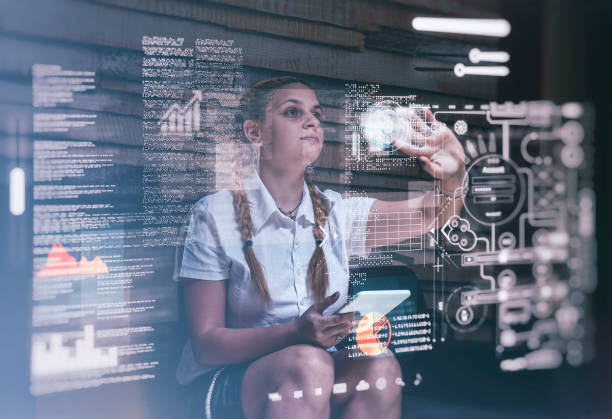 istock Young woman using tablet and infographic screen at home.Futuristic user interface. 1056853440