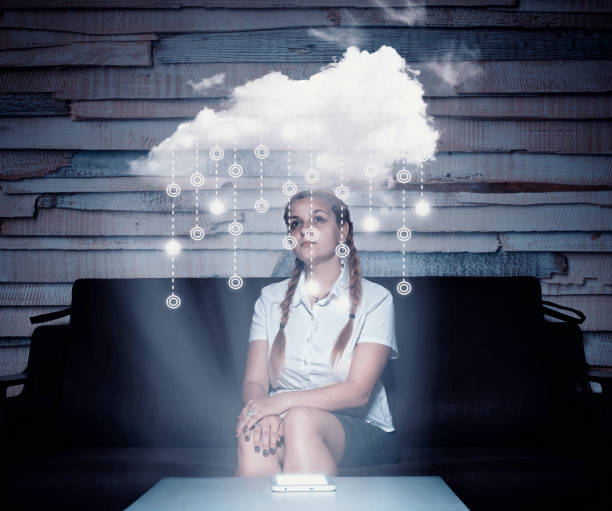 istock Young woman using a hologram cloud at home.Futuristic user interface. 1056853516