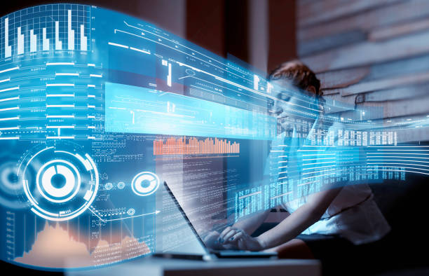 istock Young woman working on laptop at home.Futuristic user interface. 1056853728
