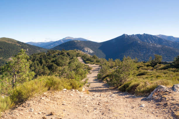 The walk from Cercedilla to the peak of Aguila, Madrid, Spain. Panoramic Sierra de Guadarrama National Park. Sunrise views