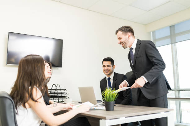 istock Colleagues Discussing In A Meeting 1056869474