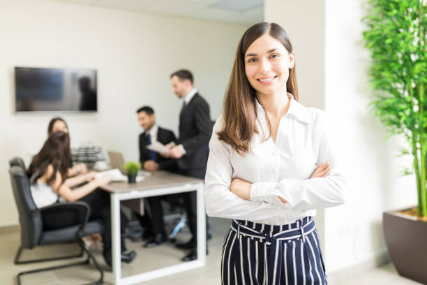 istock Company Owner Smiling In Office 1056869594