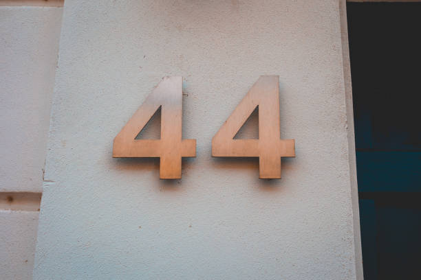 istock golden number 44 door sign 1056872570