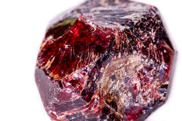istock Macro of a mineral garnet stone on a white background 1056874142