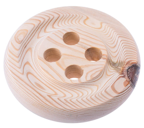 istock big wooden button isolated on a white background 1056874166
